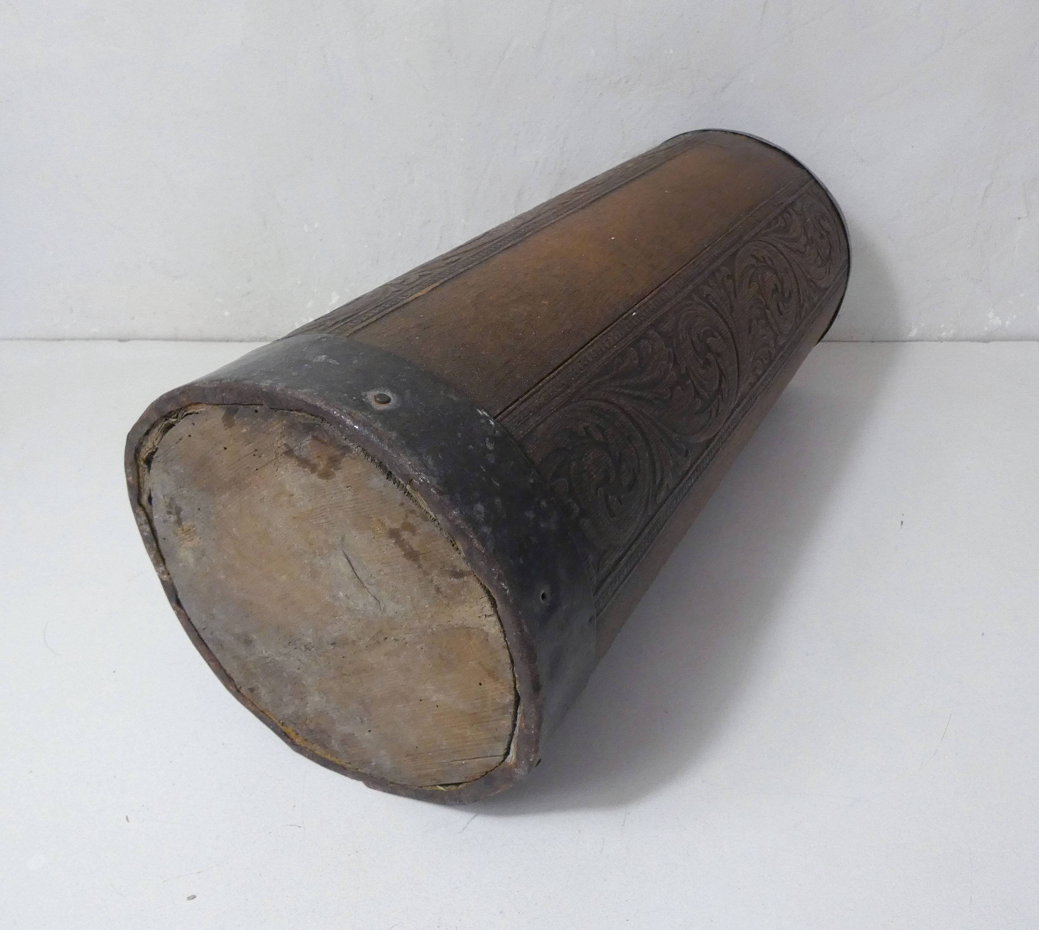 old carved wooden umbrella stand