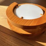 Round pine and plexiglass wall light, 1970