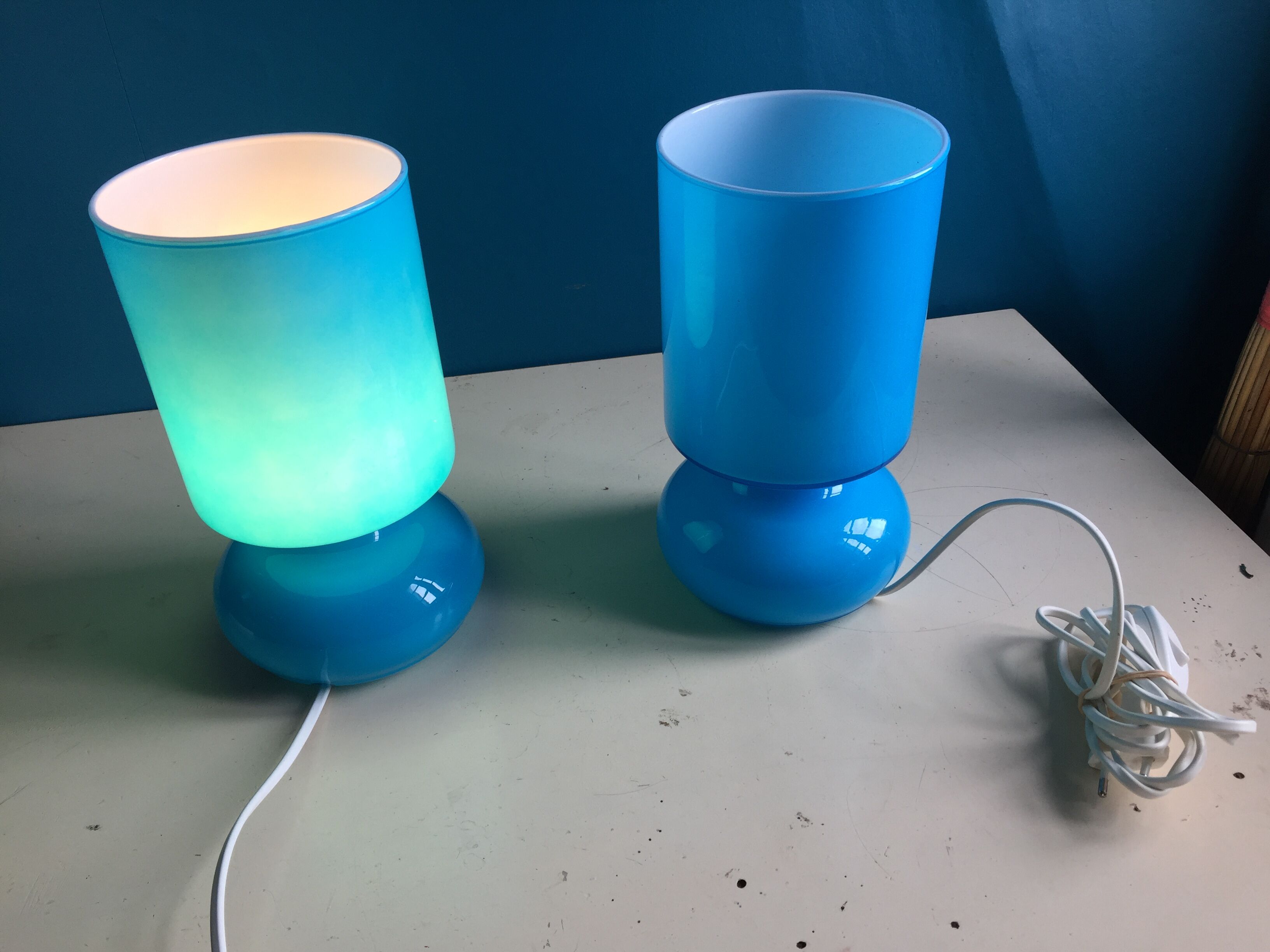 Two handmade IKEA 1980 blue glass candy lamps