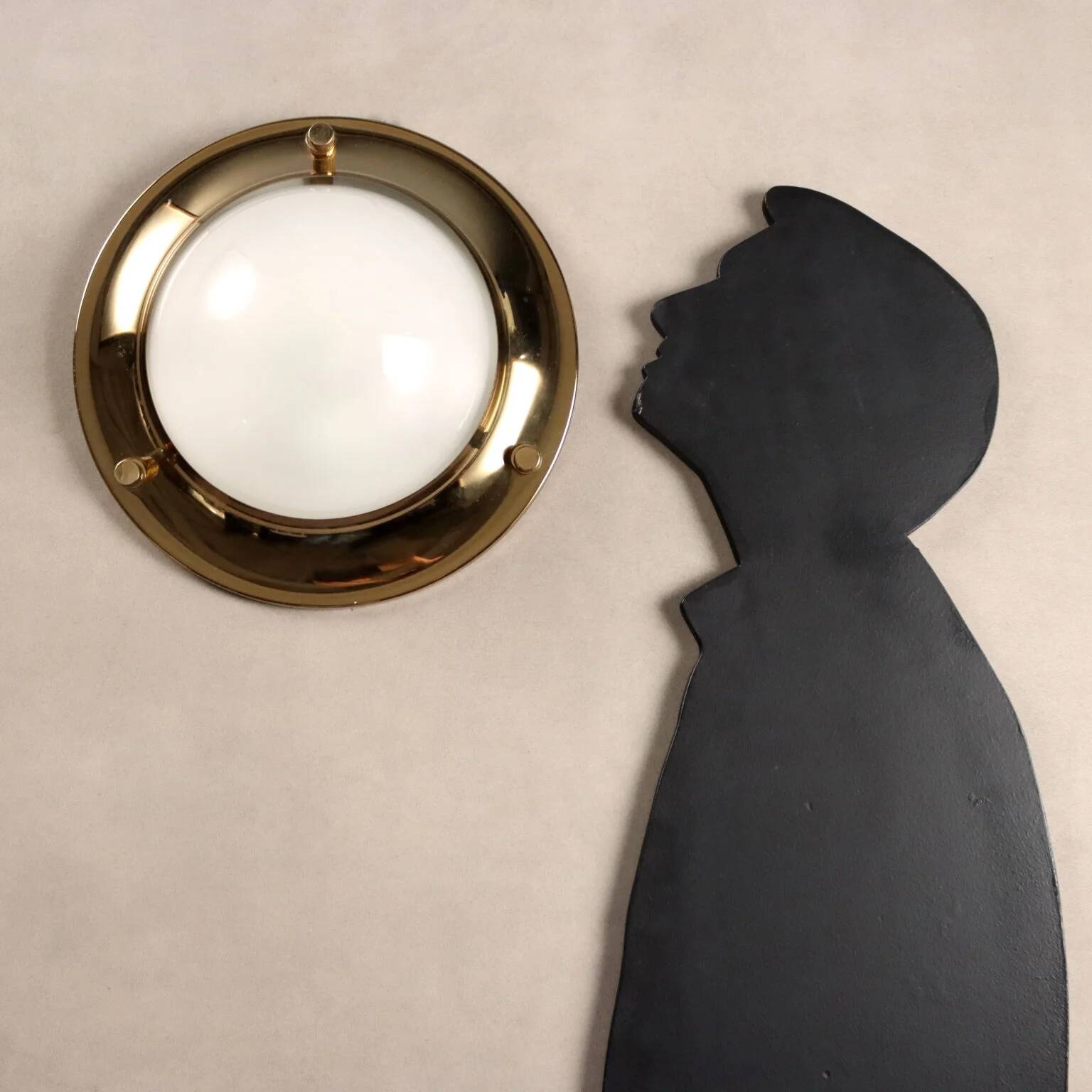 Vintage wall light in aluminium, brass, and glass, 1970s design.