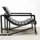 Black leather chaise longue, Eileen Gray design, 1927, France, circa 1975.