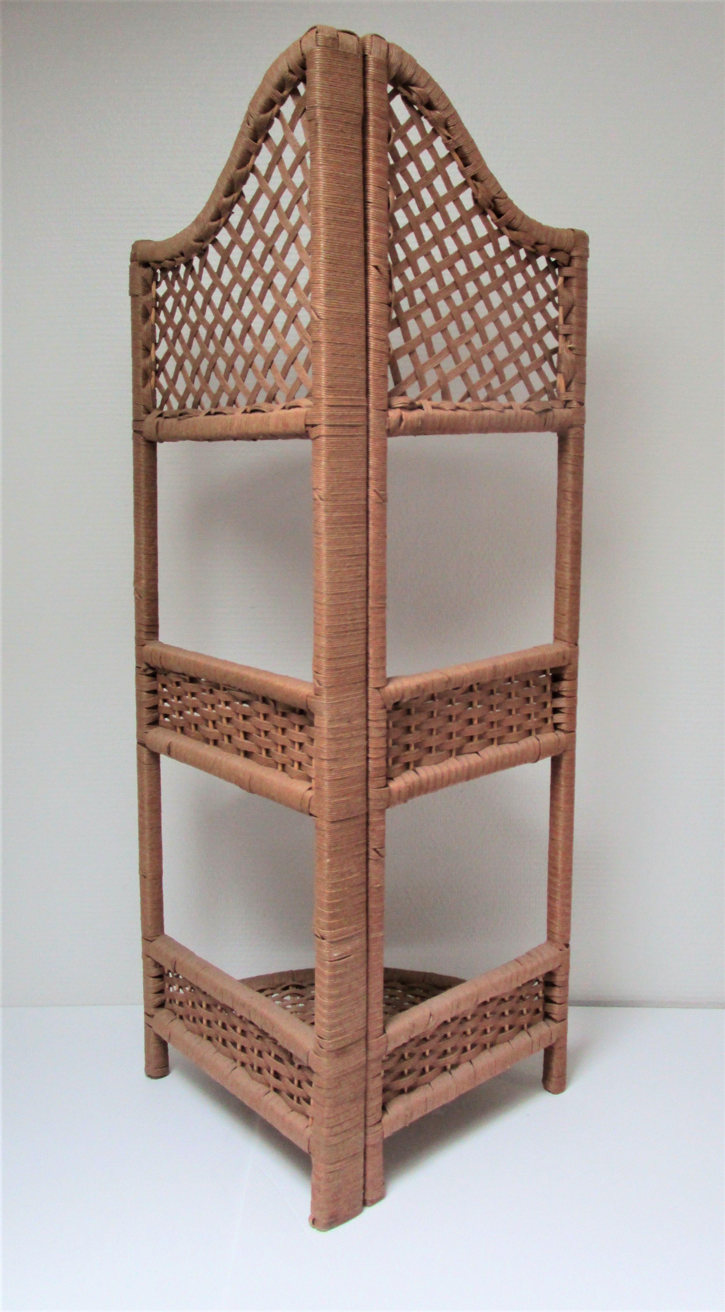 Corner shelf made of vintage braided natural fibers
