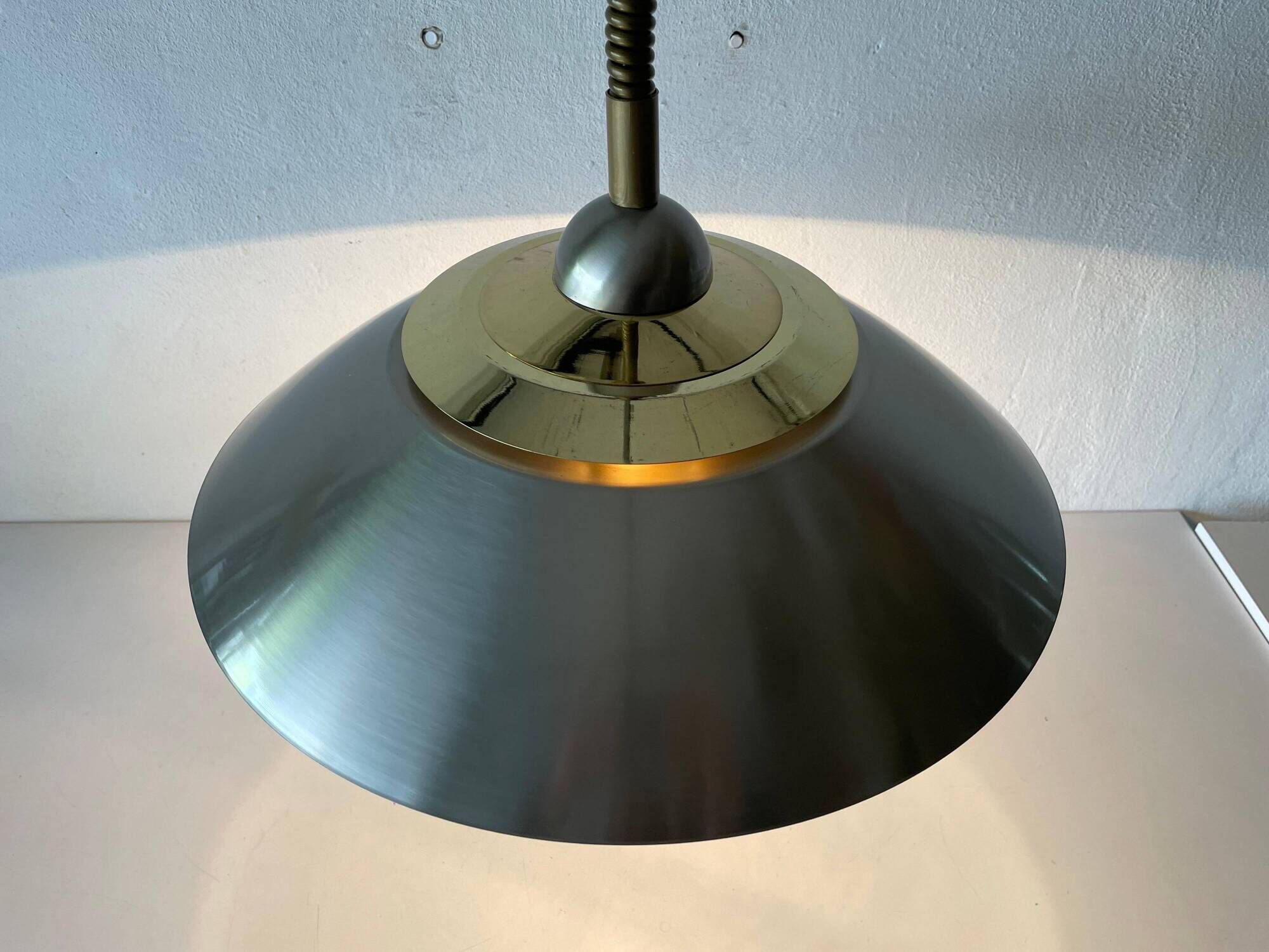 Suspended lamp in chrome and gold metal by TZ, 1970s, Germany.