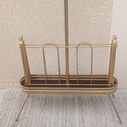 1960s brass folding magazine rack with lacquered wood decoration.
