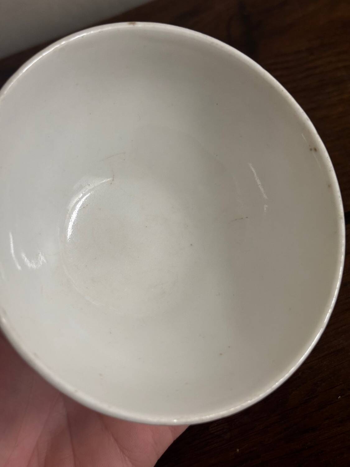 Vintage small antique bowl with floral decoration.