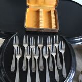 Service serving 12 small Art Deco forks made of silver metal Silver Apollo