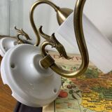 Pair of swan neck wall lights in brass, white glass and porcelain.