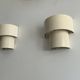 Pair of vintage modernist wall lights, white lacquered metal, Sweden 1970