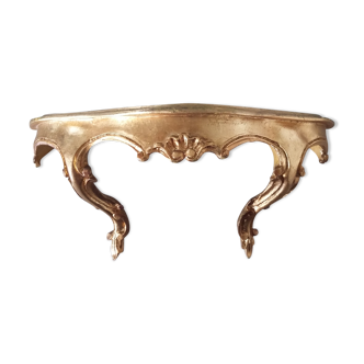 Shelf console in gilded wood