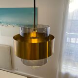 Brass and glass suspensions