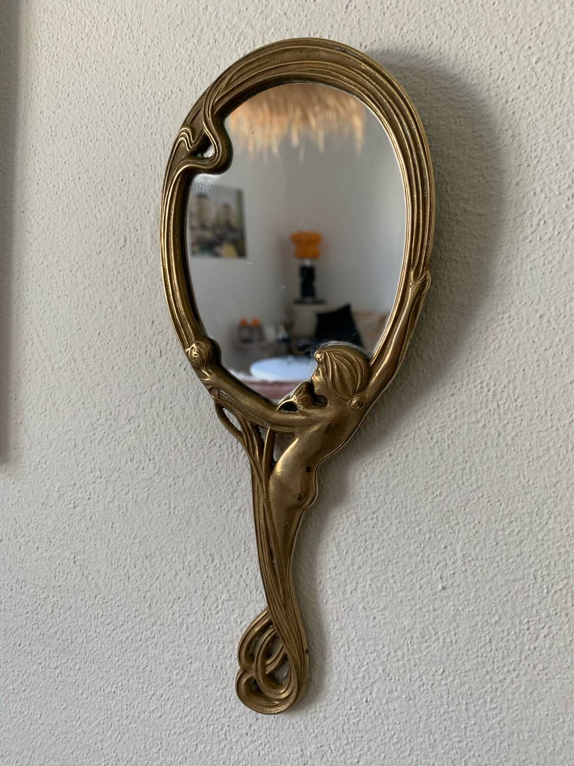 Art Nouveau brass mirror for women