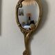 Art Nouveau brass mirror for women