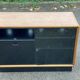Vintage wood and black glass TV cabinet buffet