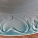 Hollow dish decorated with ceramic st-Amand lions
