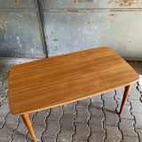 Extendable teak dining table