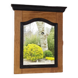 Black mirror and raw natural wood