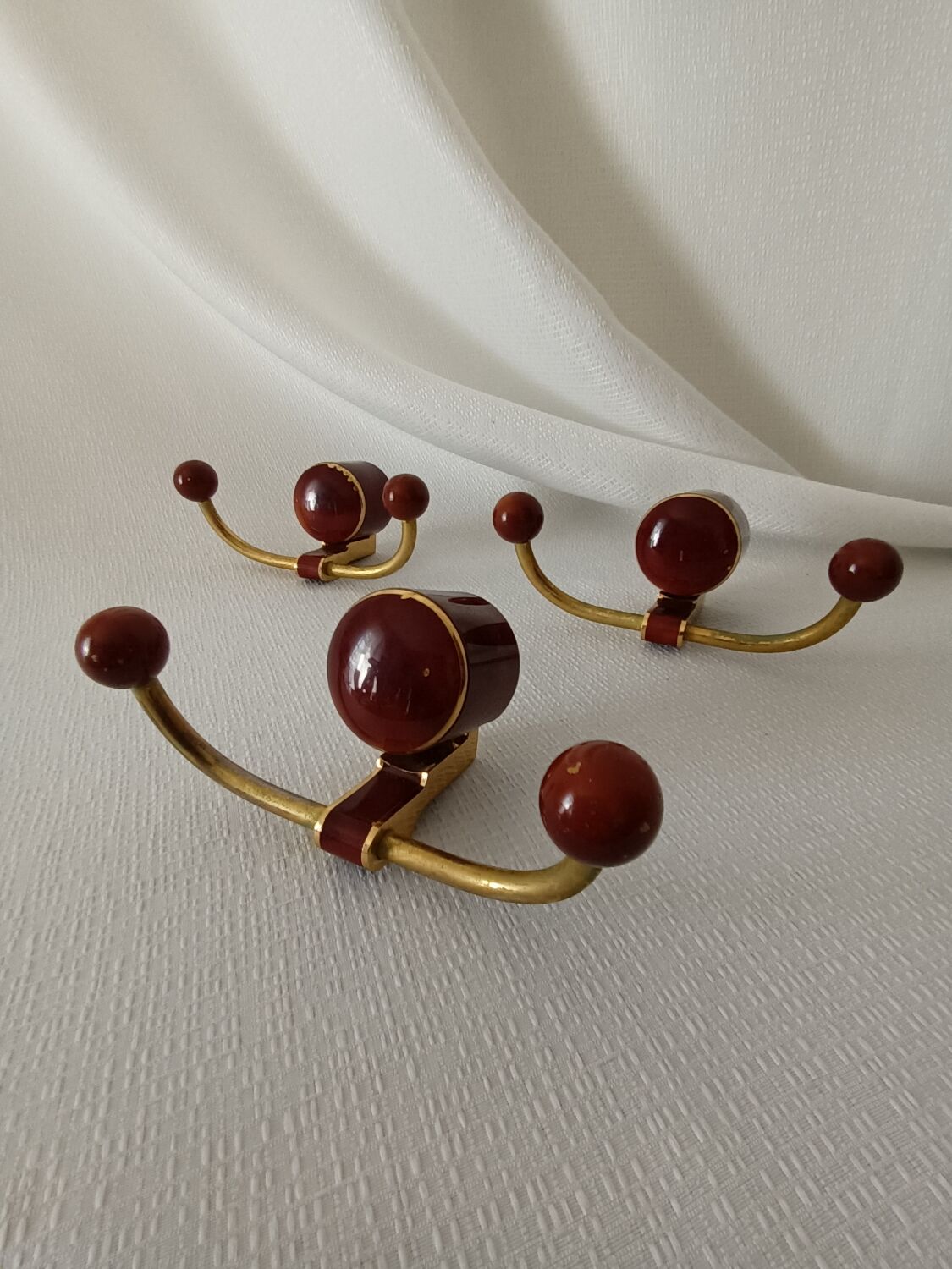 Art deco bakelite brass hooks