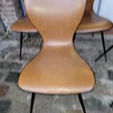 4 vintage chairs in skaï and metal base from the 60s