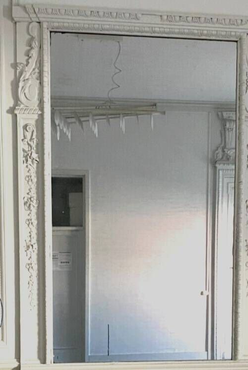 Louis XVI style mirror in wood and carved stucco 20th century