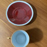 Hand-painted Limoges porcelain cup and saucer signed R. Blier
