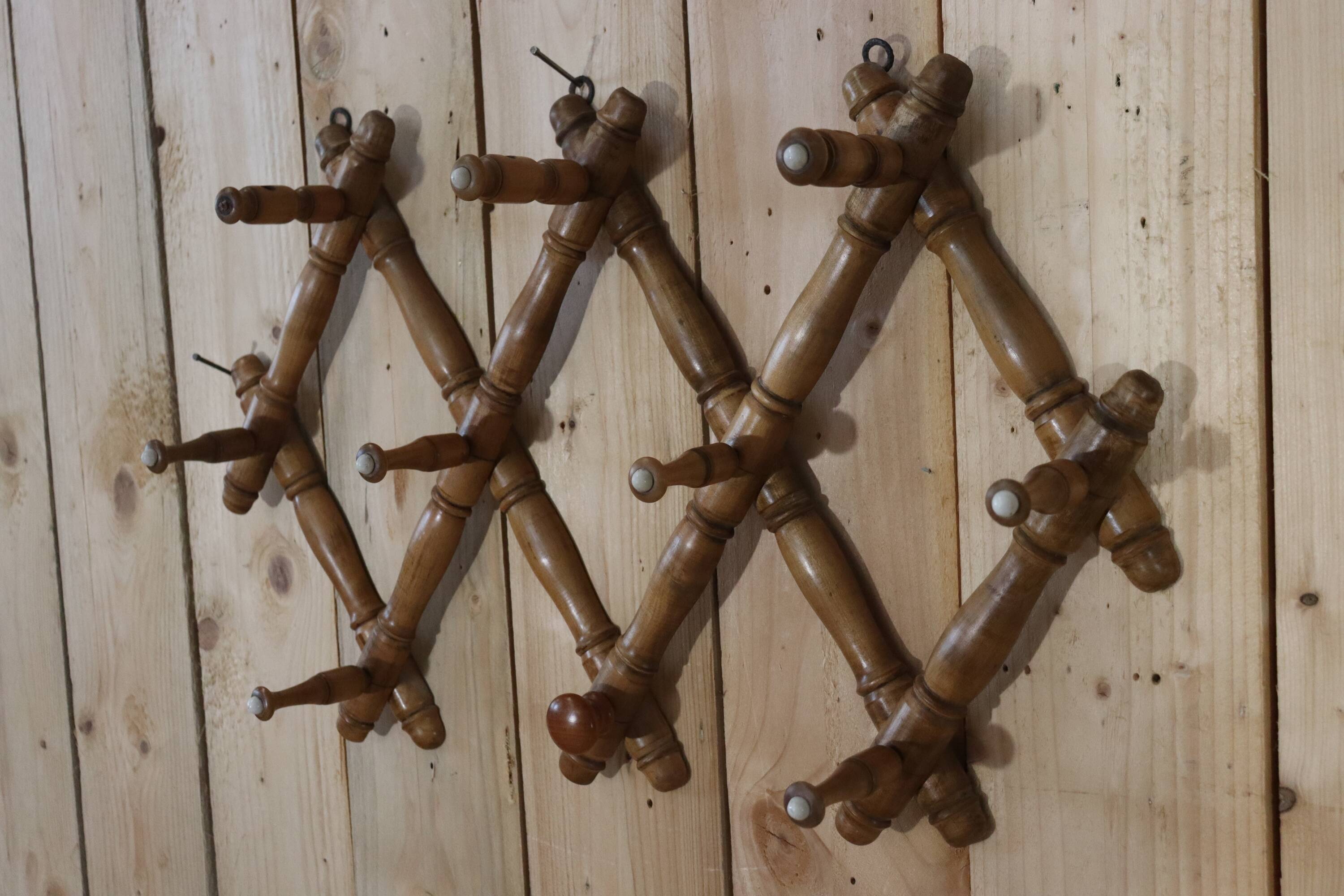 Old turned wooden wall coat rack