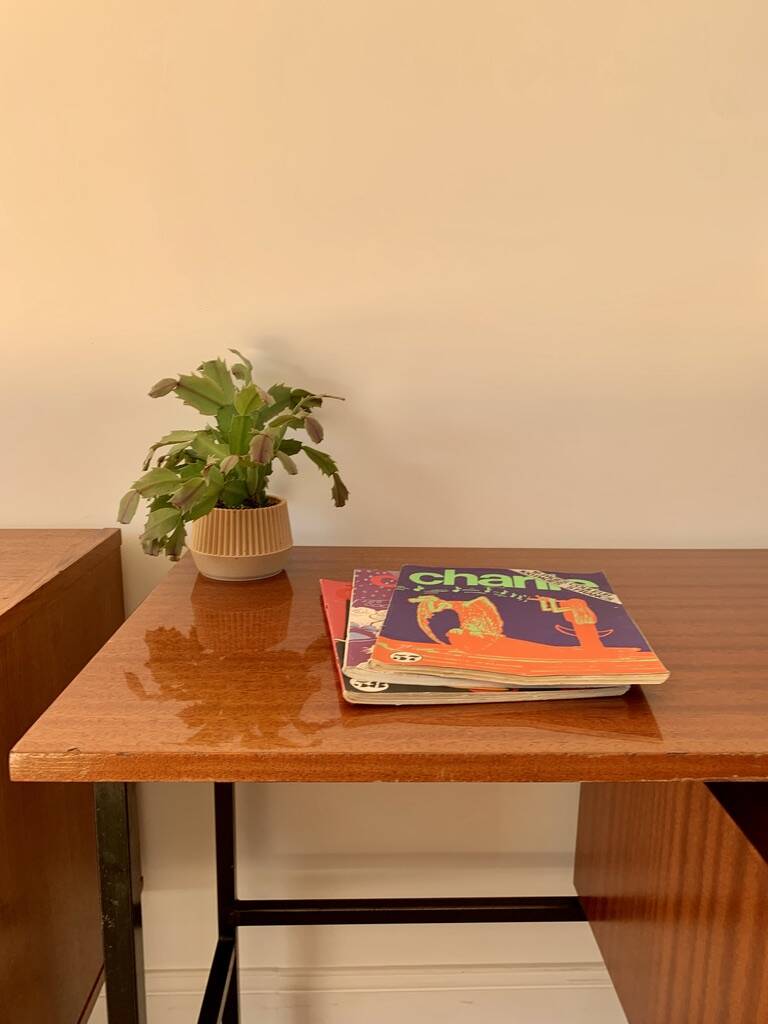 lacquered wood desk and black steel legs design from the 60s and 70s