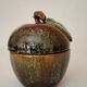 Covered stoneware pot