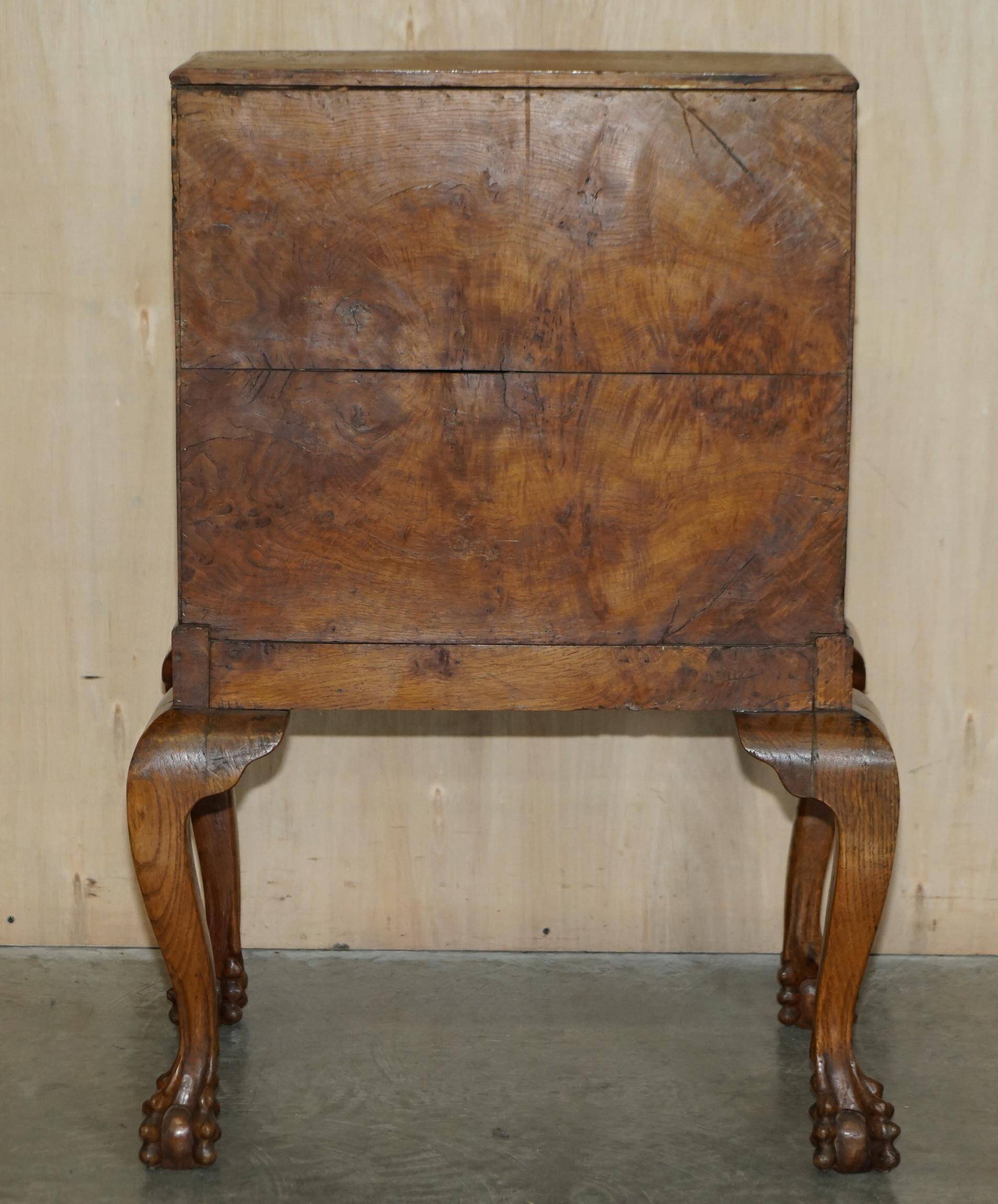 Writing desk in pollard oak from around 1800 with claw and ball carved legs.