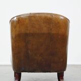 Stylish armchair made of cowhide leather with a unique design and beautiful finish