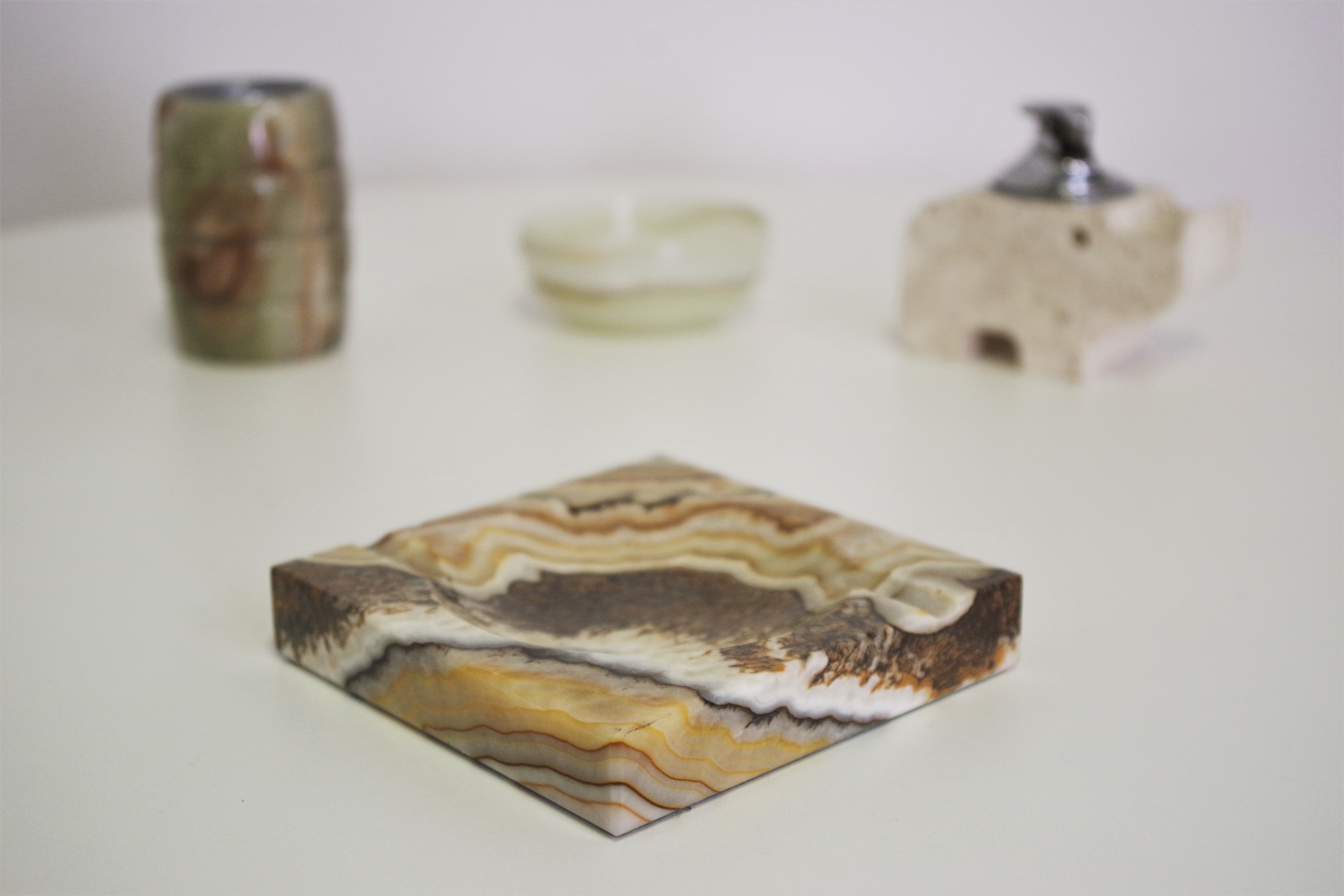 Smoking accessories in marble and onyx, 1970s, lot of 4