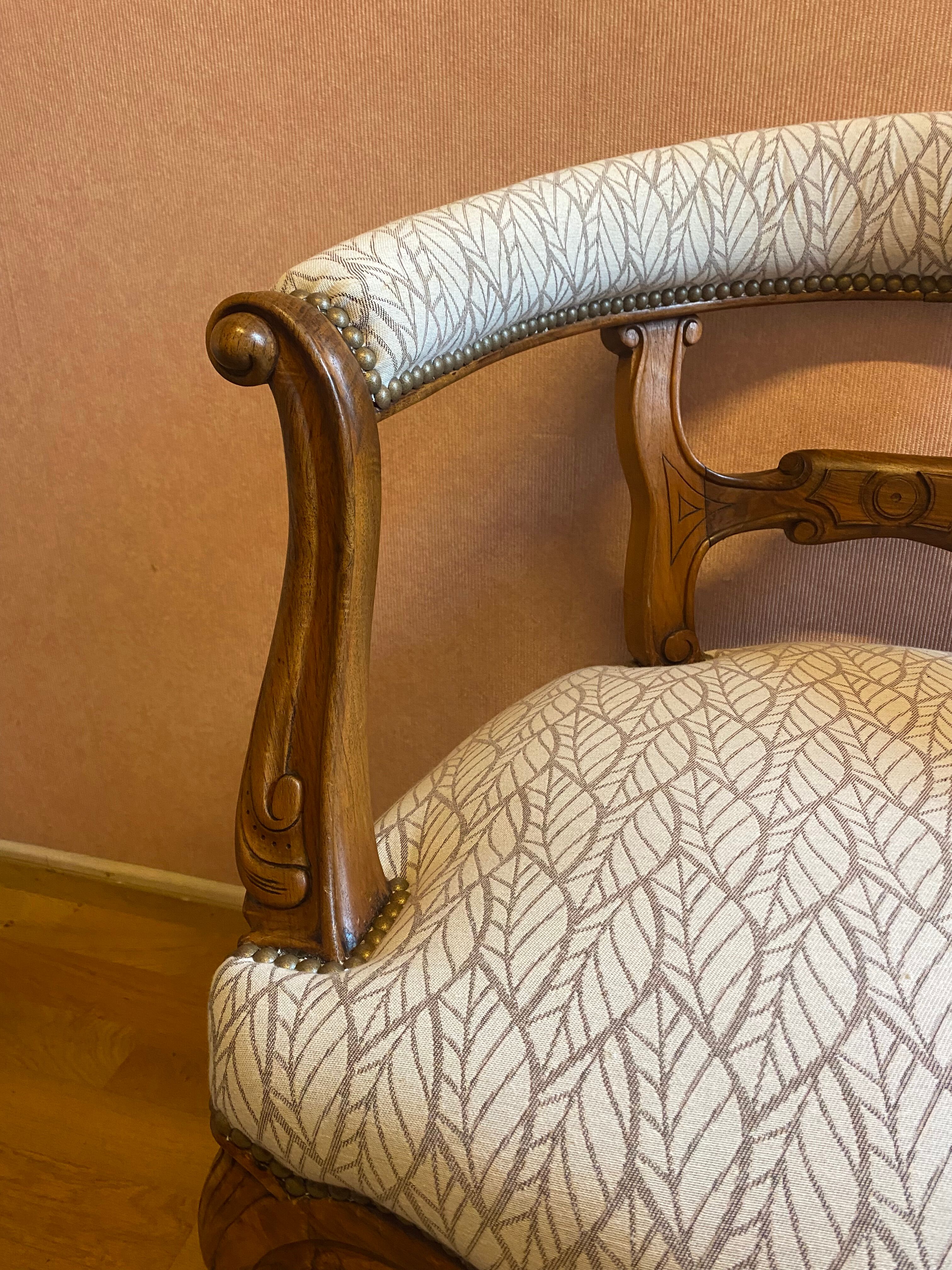 office armchair in walnut, nineteenth century, fully trimmed and reupholstered.