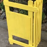 Yellow vintage coat holder