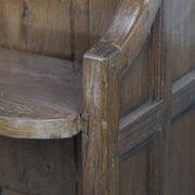 Antique oak church bench in Gothic style with beautiful wood carving