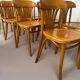 Set of 8 vintage bistro chairs in bent wood, Baumann / Tho style.