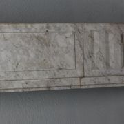 Old fireplace in white marble veined Louis XVI