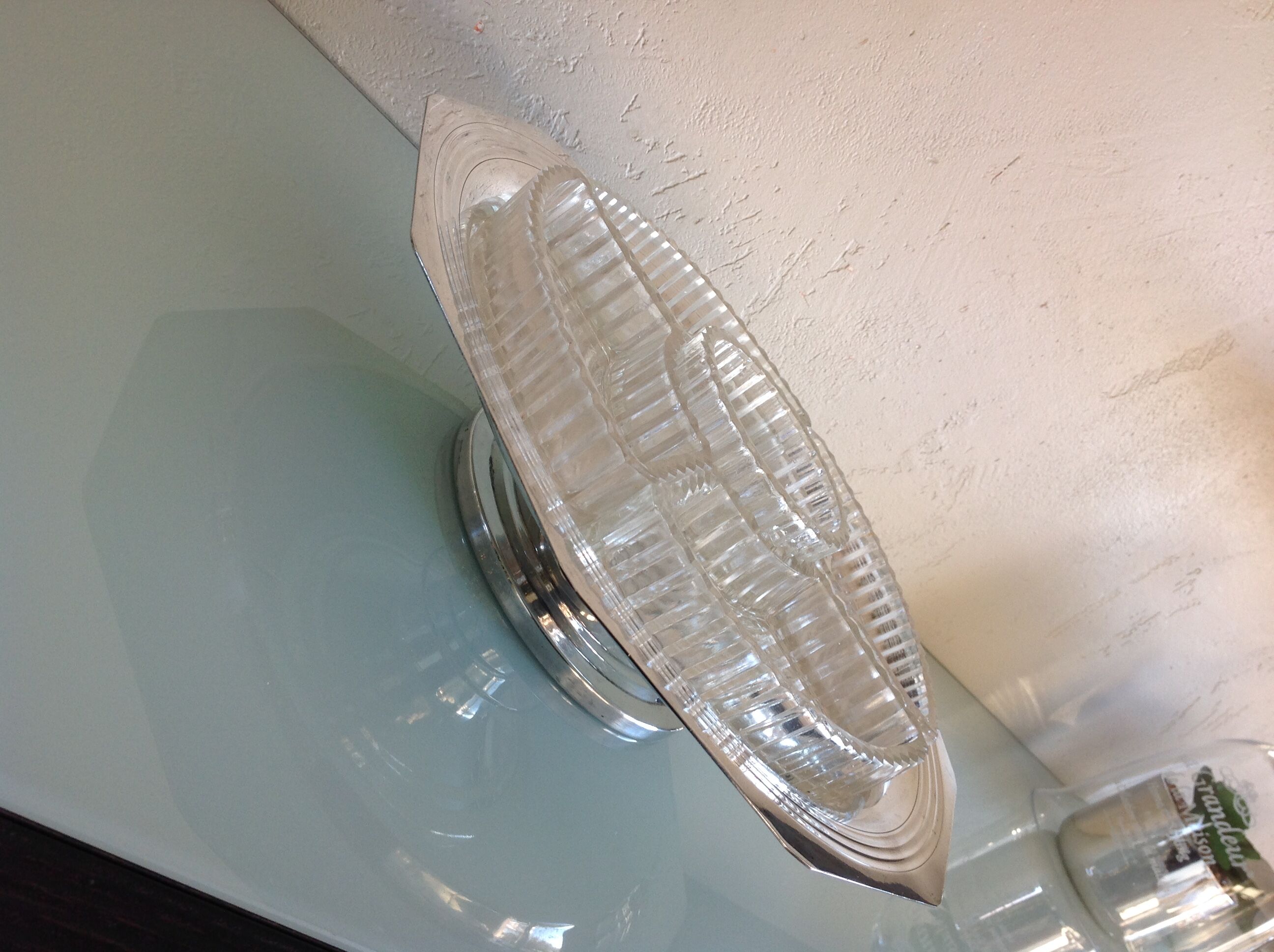 Servant of table on foot shower in silver metal art deco style