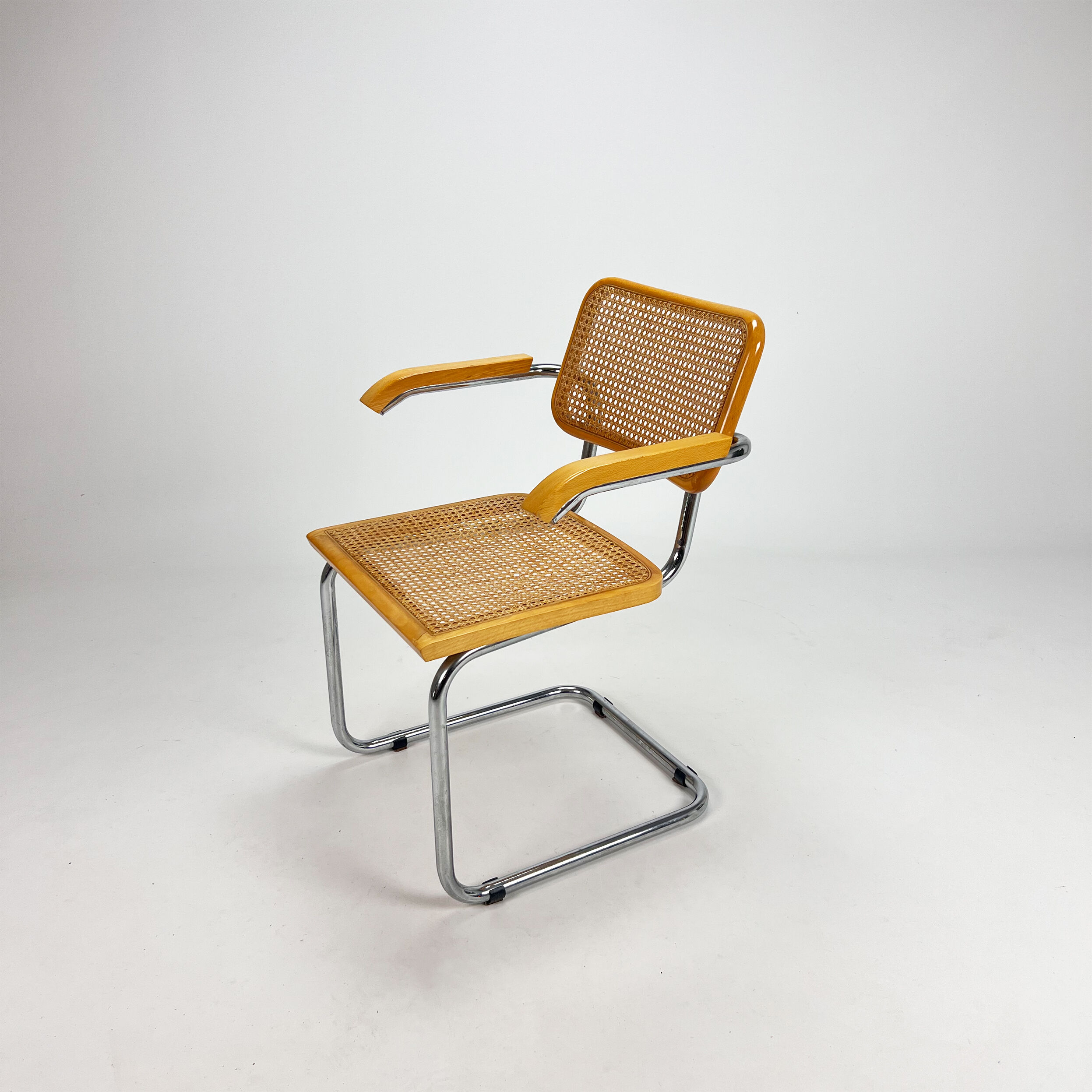 Tubular frame and cane cantilever dining chair, italy, 1970s