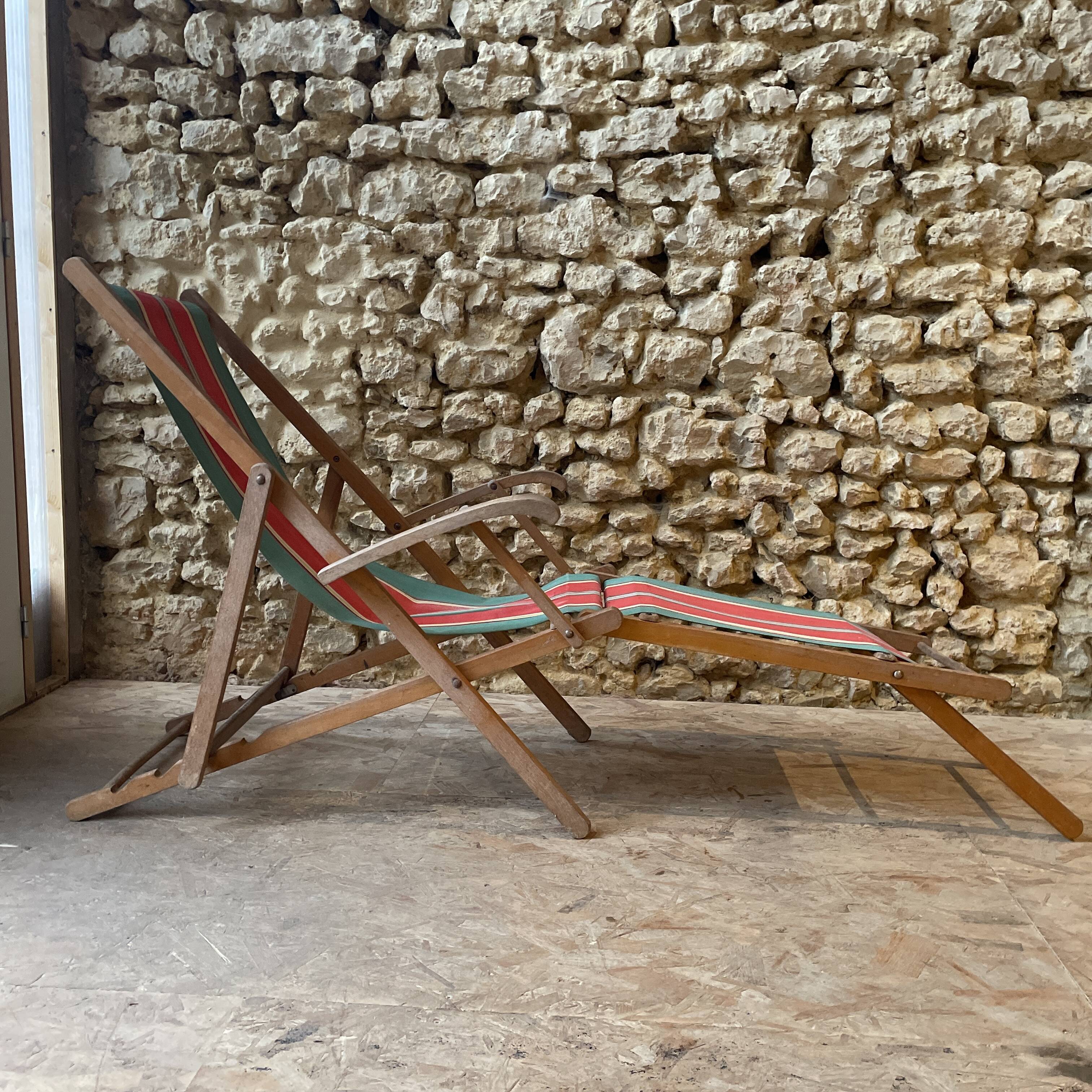 Red and green striped wooden deckchair