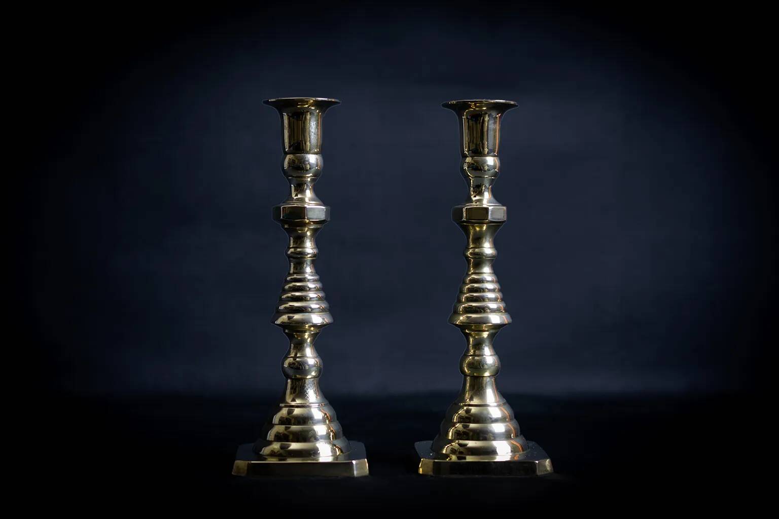 Pair of Victorian copper and brass candlesticks