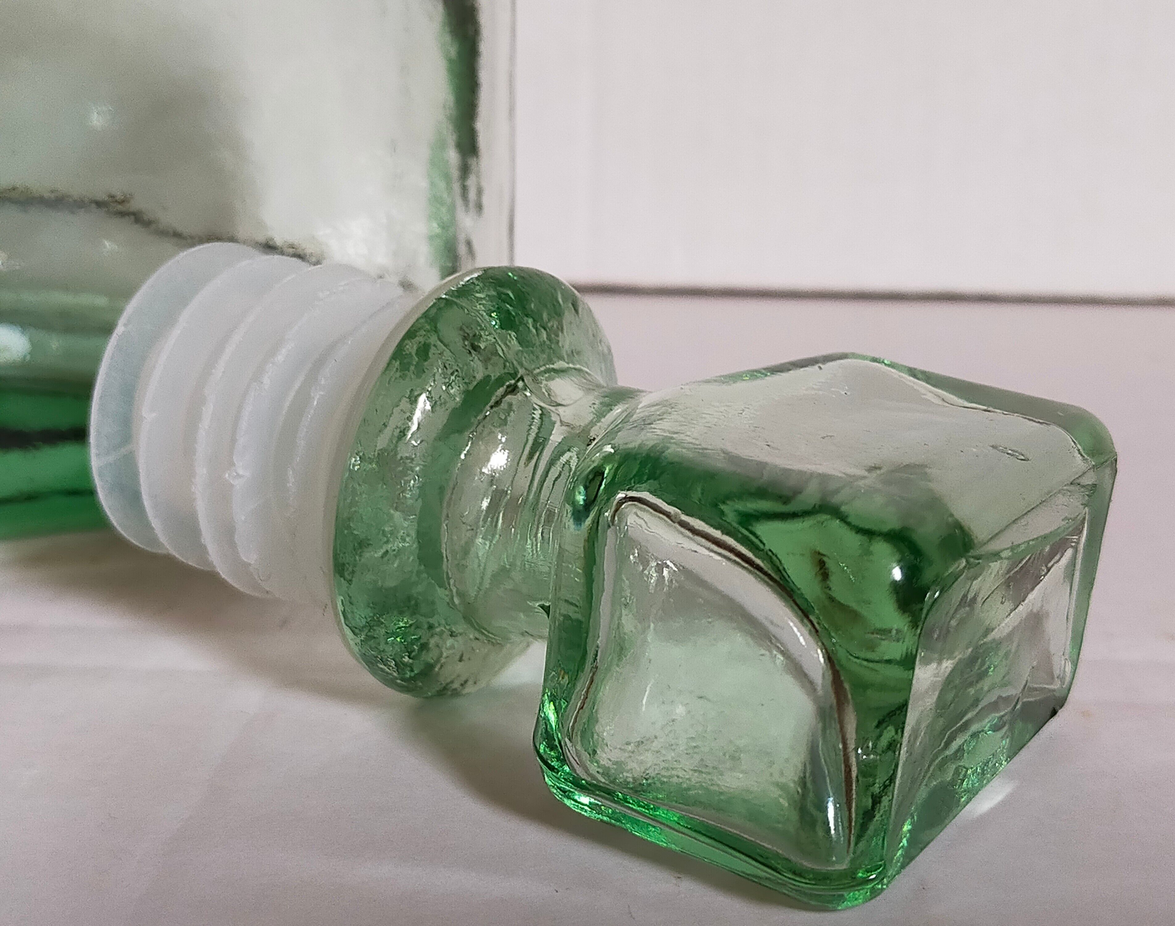 Vintage green glass whiskey decanter