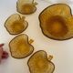 Amber glass dessert service in the shape of an apple made in Italy.