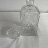 Molded glass carafe, 1960s-1970s, stylized flower decoration, oval, square base, stopper, rosette