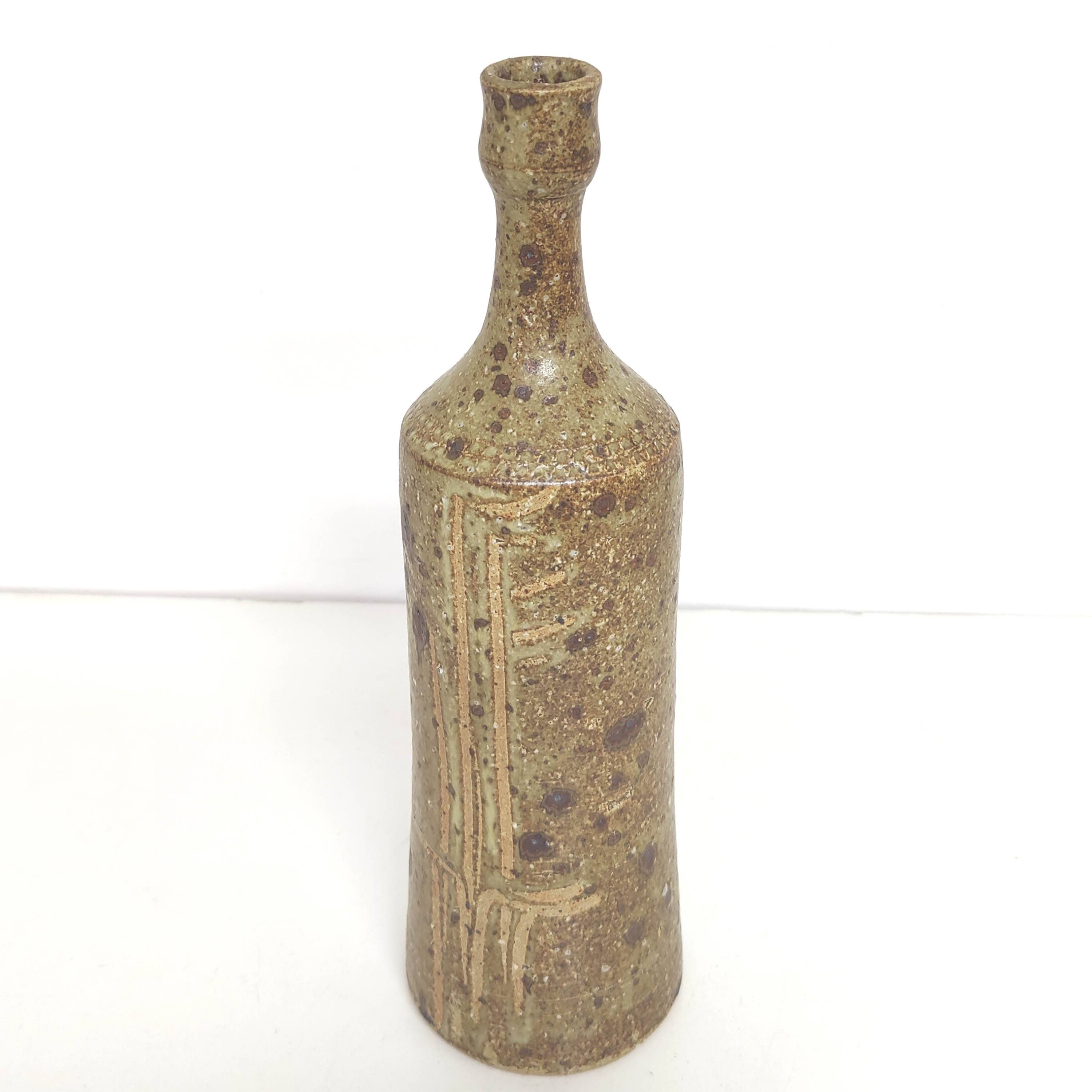 Bottle vase in sandstone pyrite floral decoration signed