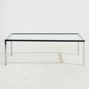 Chrome and glass coffee table.