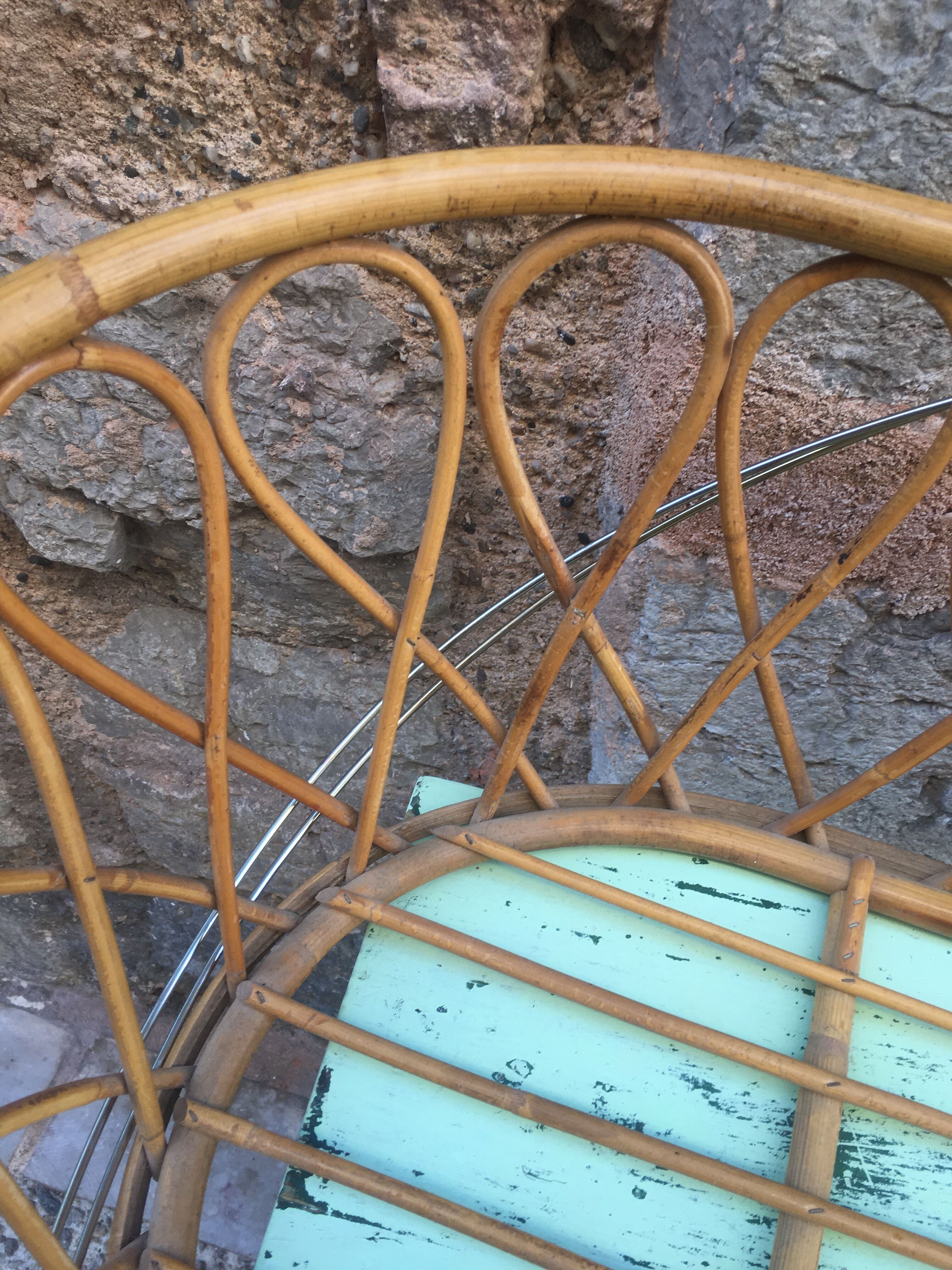 Rattan bassinet with hood arches