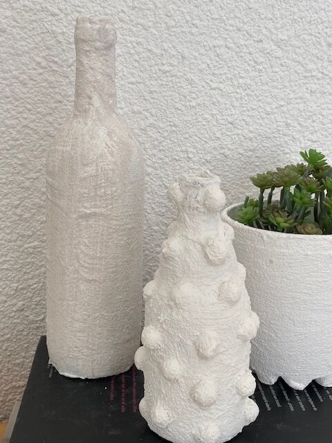 Trio of white vases