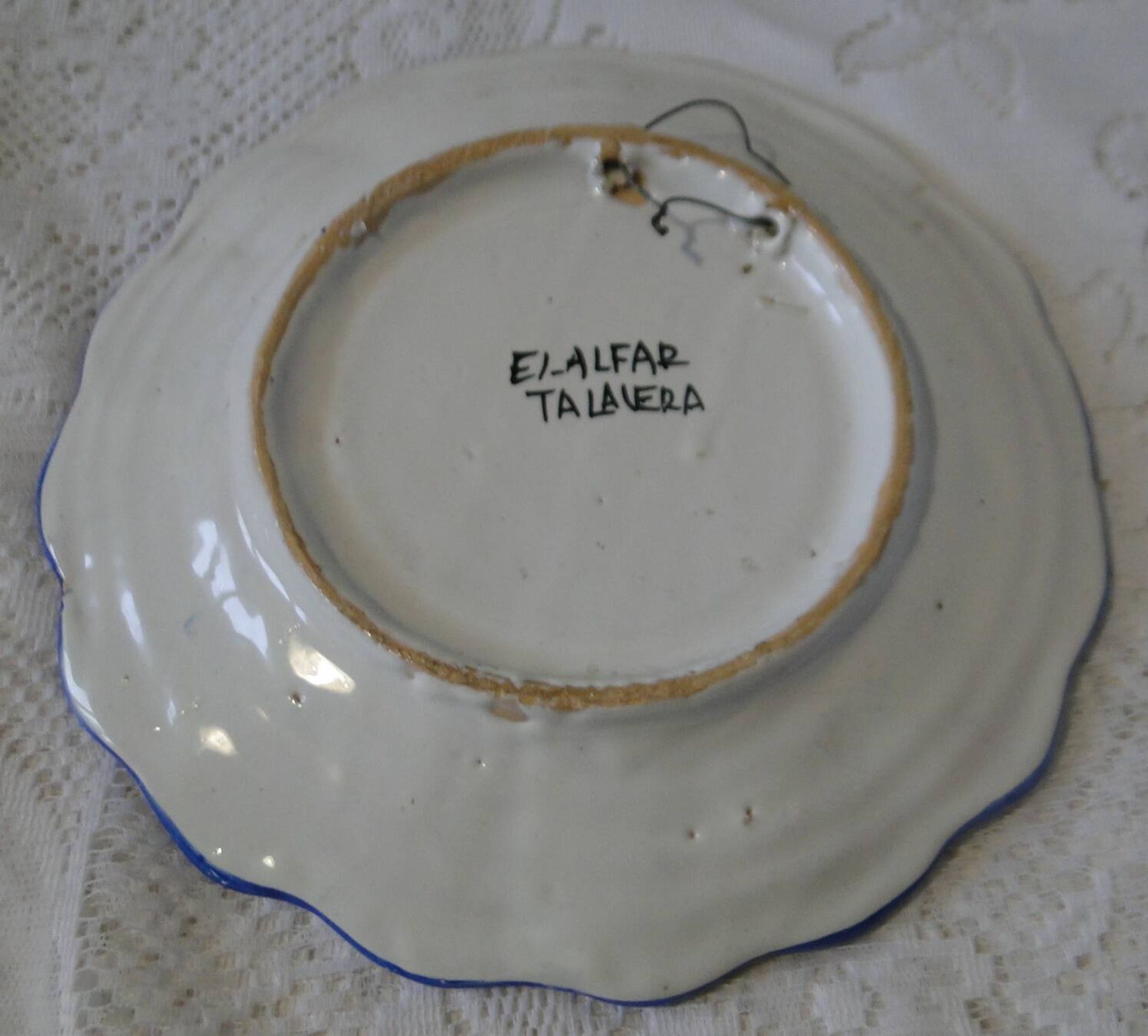 Decorative earthenware plate with floral Talavera decoration