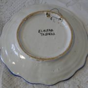 Decorative earthenware plate with floral Talavera decoration