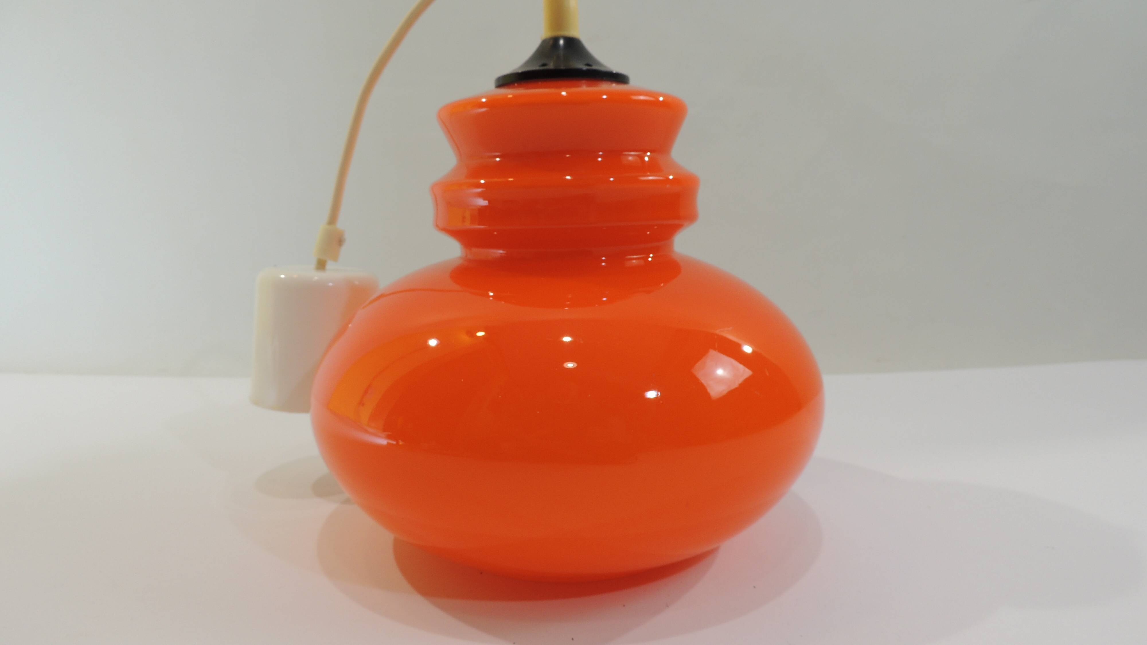 Vintage pendant light in Orange opaline/space era/vintage