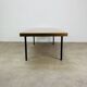 1950s modernist coffee table, wood and black metal.